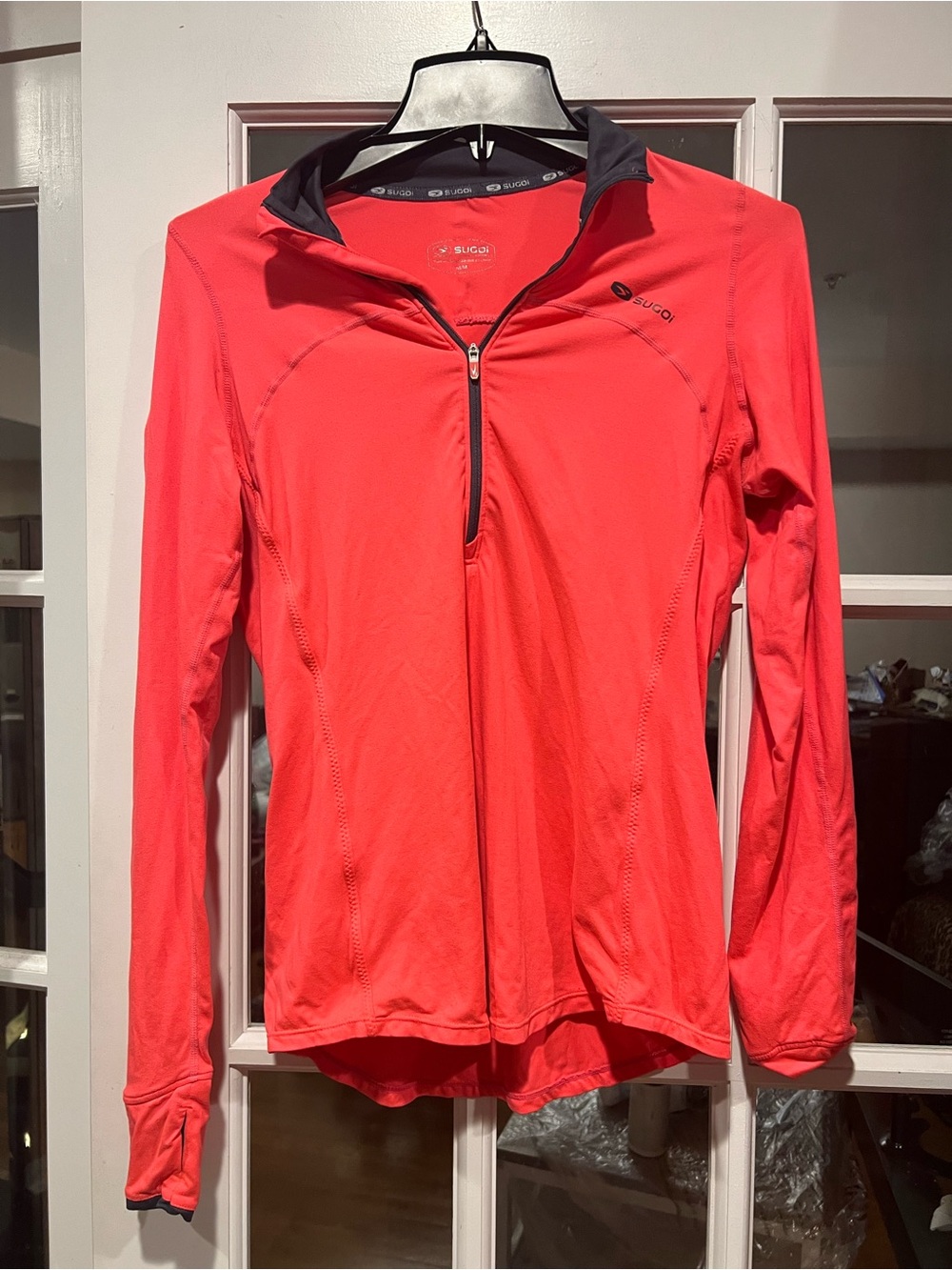 SUGOI Bright Coral Half-Zip Long Sleeve Performance Top